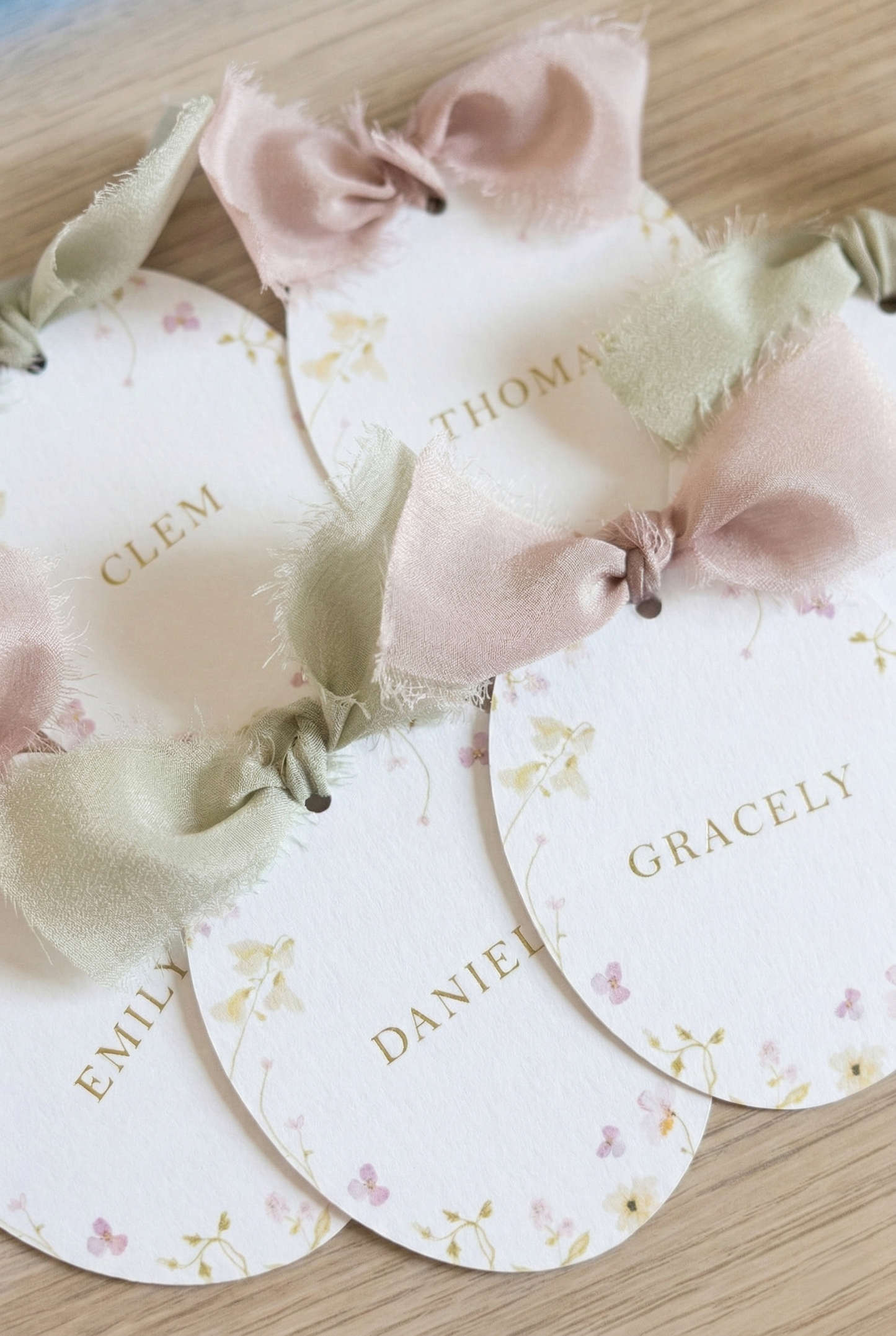 A Wildflower Oval Wedding Place Card with Pure Silk Ribbon